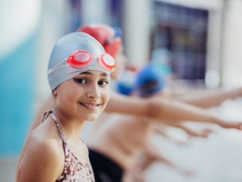 young-kid-competitive-swimmer-goggles-swimming-pool